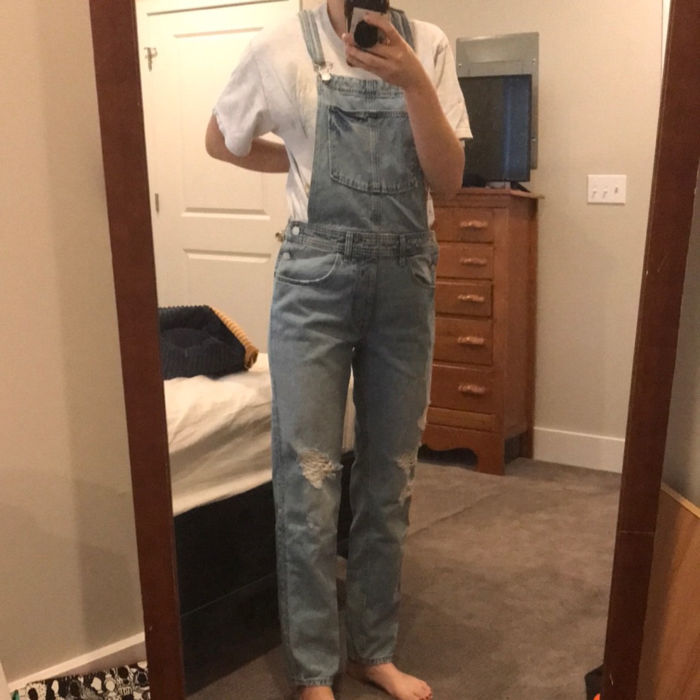 light wash ripped denim overalls